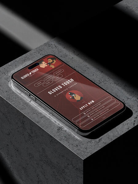 Smartphone displaying a red-toned app interface titled 'GLOVED TOUCH' with illustrated portraits and an 'APPLY NOW' button on a textured dark surface under diagonal light.